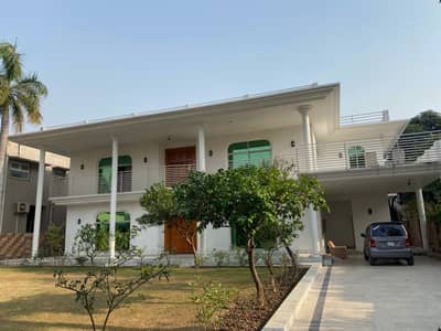 2 KANAL ELEGANT AND FULLY MAINTAINED SUPER HOT LOCATED BUNGALOW IS AVAILABLE IN THE BEST BLOCK OF DHA LAHORE