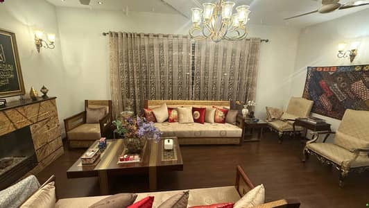 1 KANAL ELEGANT AND FULLY MAINTAINED BUNGALOW WITH 10 KVA SOLAR IS AVAILABLE IN THE BEST BLOCK OF DHA LAHORE | NON FURNISHED (450 K) | FURNISHED OPTION IS ALSO AVAILABLE.