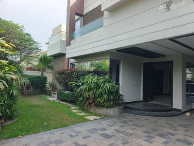 1 KANAL ELEGANT AND FULLY MAINTAINED SUPER HOT LOCATED BUNGALOW IS AVAILABLE IN THE BEST BLOCK OF DHA LAHORE