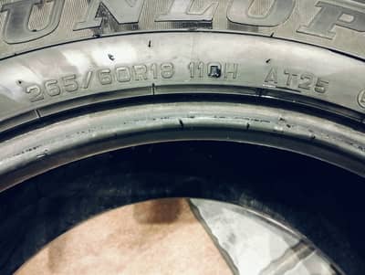 Dunlop tyres, size is 265 60 18