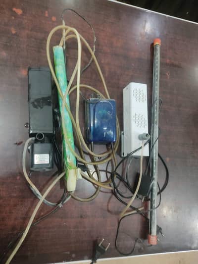 pack of aquarium accessories and air pump