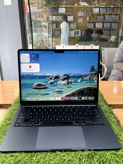 MacBook Air M2 Chip , 8/256 , With Genuine Charger.