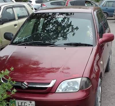 Total genuine, home used Cultus 2011 Lahore reg, engine 100 percent