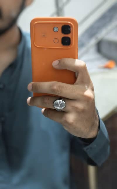 Infinix not eag 60 orange color 8GB 256GB.  yes 10/10