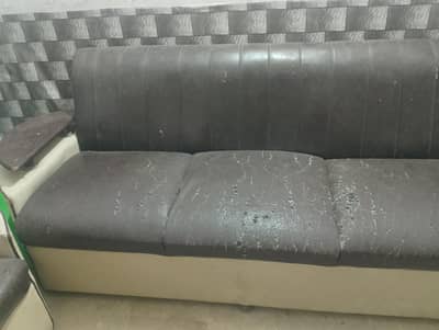 5-5 Seater Sofa Set_ Solid frame & foam, Fabric needs replacement.