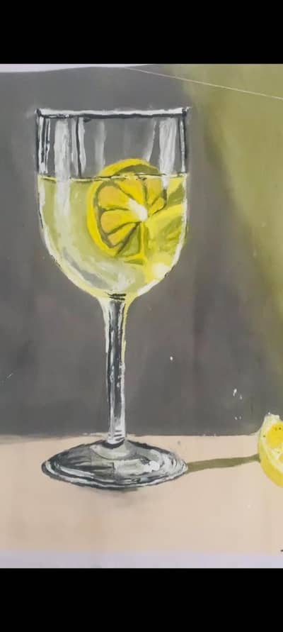 Glass of white wine with a lemon slice