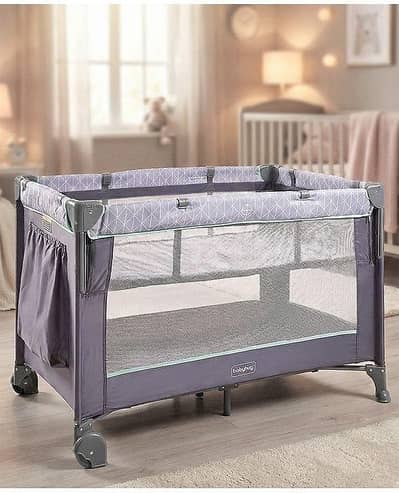 Almost brand new Baby Cot with complete accessories
