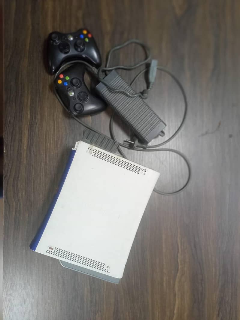xbox 360  with wireless controllers 2