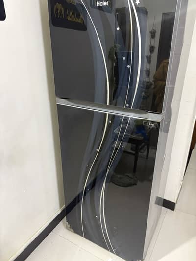 Haier glass door fridge in mint condition