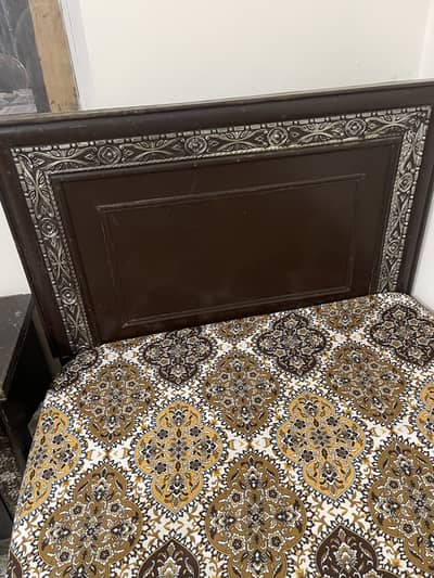 Single wooden bed