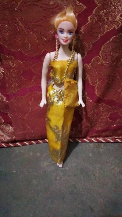 barbie doll yellow dress used.