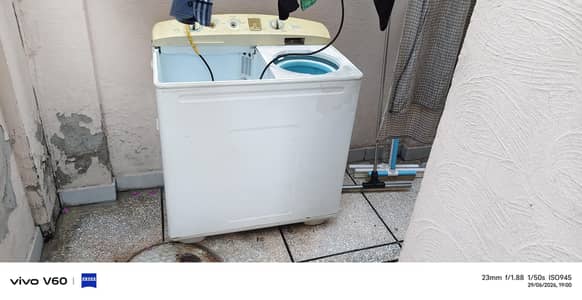 dawnlance washing machine duel in good working condition.