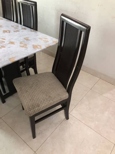 Glass top dining table with 6 chairs