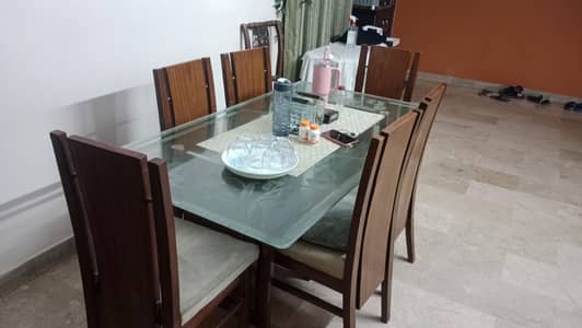 glass dining table with 6 chairs