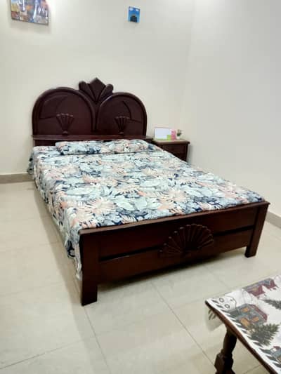 Wooden double bed for sale