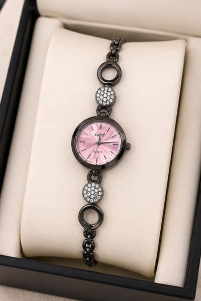Women's pink dial Quartz Watch