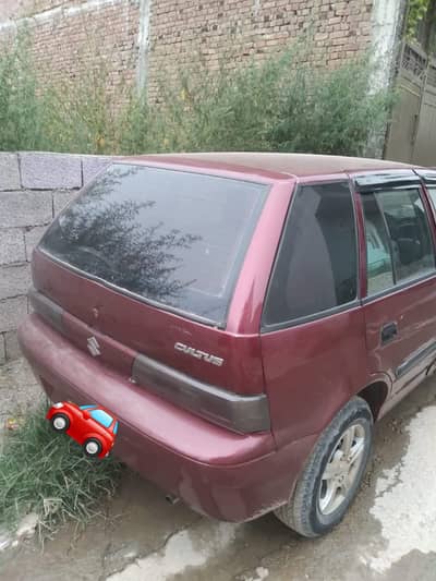 Total genuine, home used Cultus 2011 Lahore reg, engine 100 percent