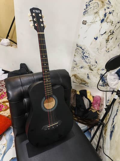 Acoustic guitar with bag