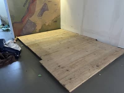 Wooden floorboards (total 8x11 ft divided between 3)