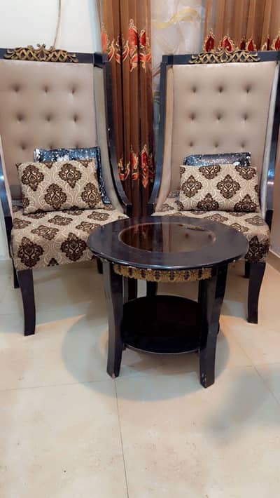 wooden 2 sofa chairs with table