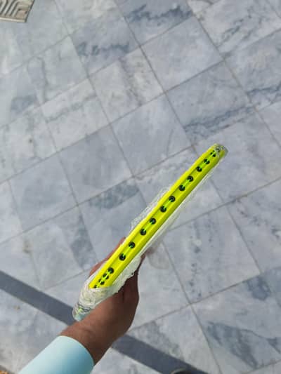 Not us this Badminton racket only one piece