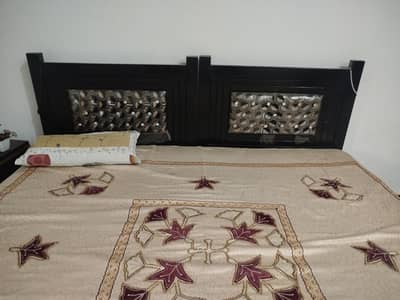 2 single beds with mattresses
