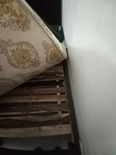wooden single bed