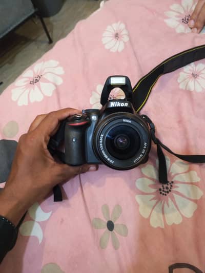 Nikon D5200 DSLR with 24.1MP DX-format CMOS sensor