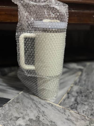Large 40oz(approx. 1.2L) insulated steel Tumbler with handle and straw.