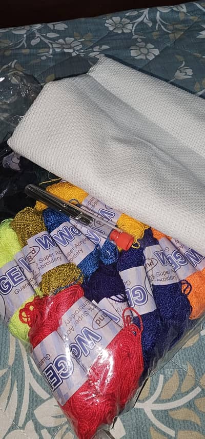 aida fabric for embroidery. . . thread and needles