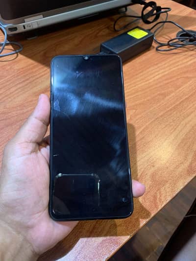 OPPO A77s one hand
