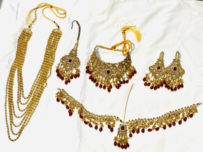 Artificial Bridal Kundan Jewelry Set Gold-Tone with Maroon Stones