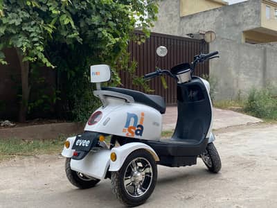 Urgent sale evee 3 wheel electric scooty only 1 week use .