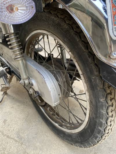 Honda 125 self start 2021  ha 2022 ki register ha sticker bhi 2022 ka