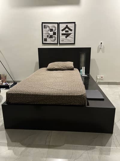 Single bed with 2 built in drawers and light