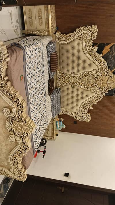 wooden bed with side tables plus dressing with mirrors