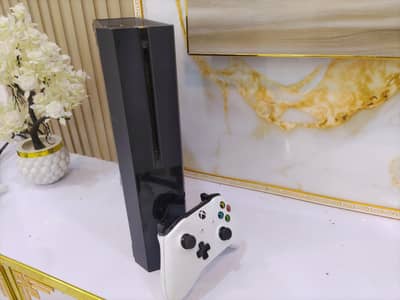 Xbox one 1tb with 16 games and one s controller in mint condition