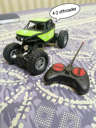 4 by 2 rc car offroading almost new