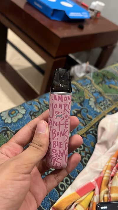 OXVA Xlim Go pod kit in the Graffiti Pink finish