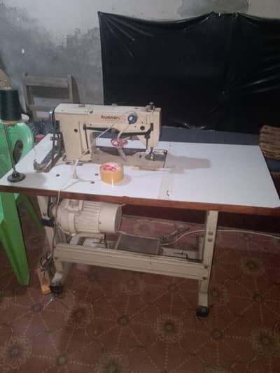 sewing machine , cutting tables with complete accessories