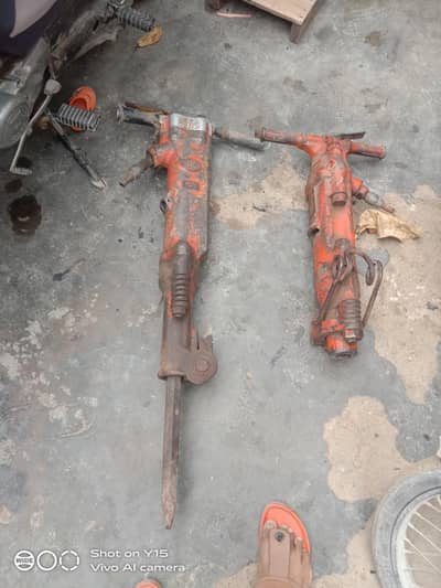 two machines and pipe