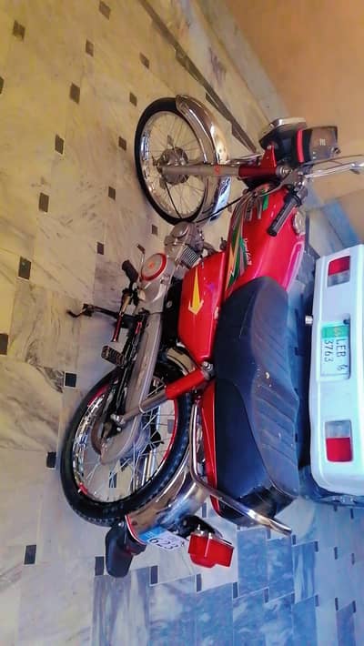70 bike United 24model number Islamabad biometric on the spot