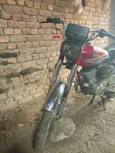 12 model Honda 125 Red