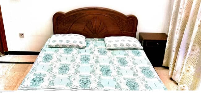 Used Wooden Bed.