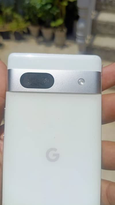 Google Pixel 7a with adapter