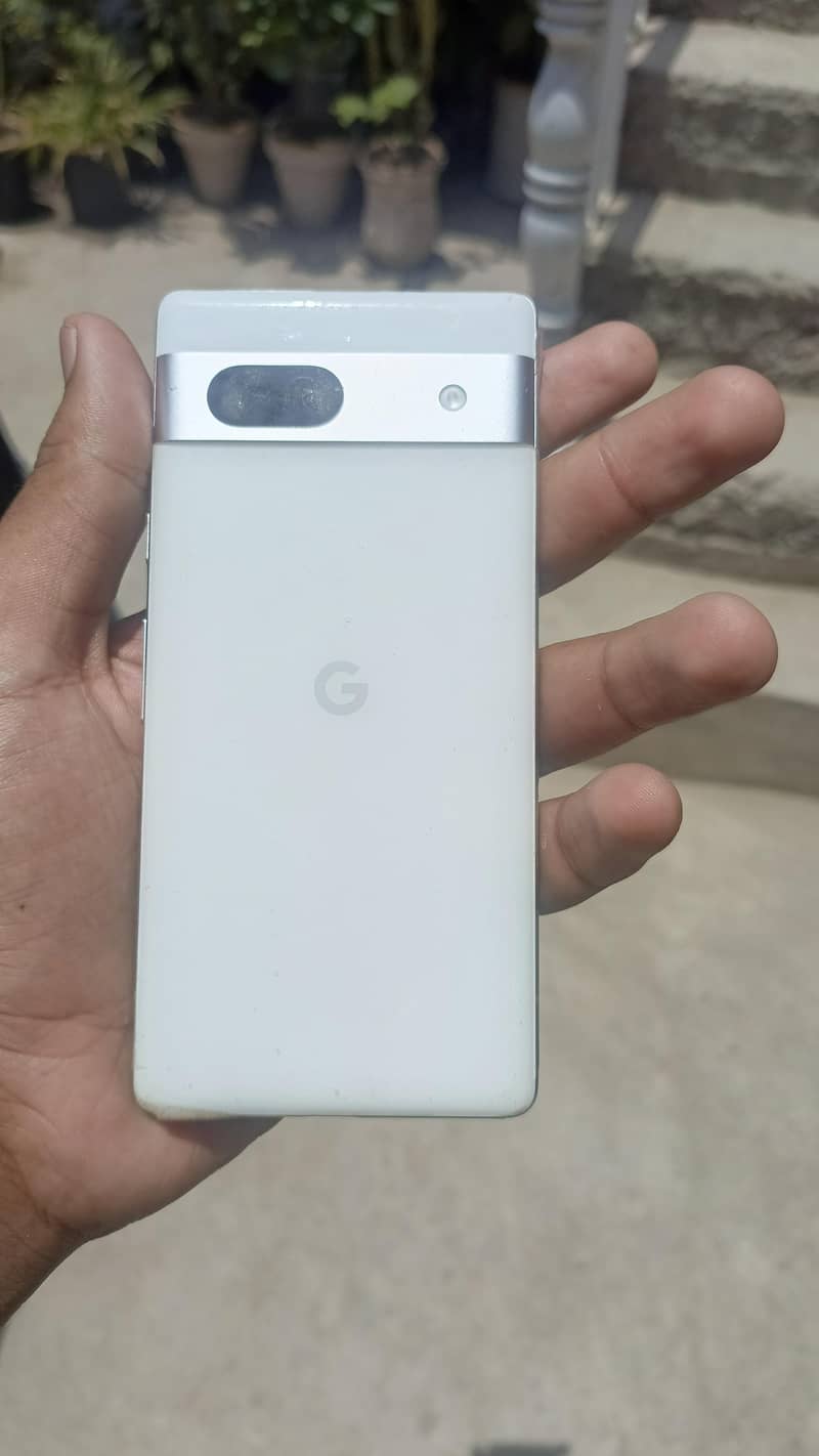 Google Pixel 7a with adapter 1