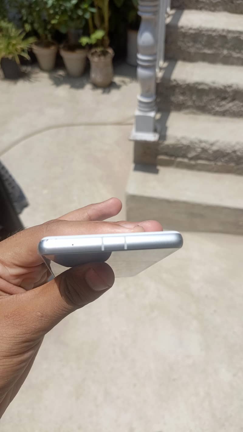 Google Pixel 7a with adapter 2