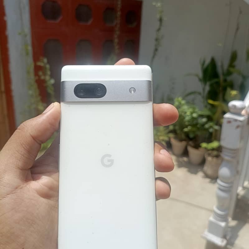 Google Pixel 7a with adapter 4