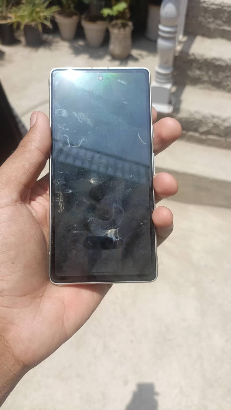 Google Pixel 7a with adapter 5