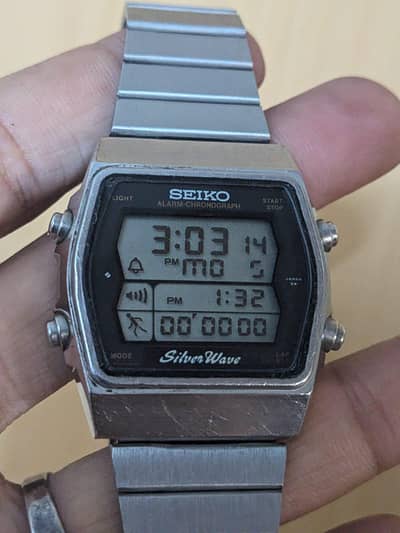 Seiko silver wave watch